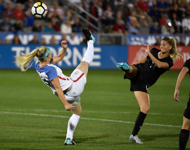 COMMERCE, CO - SEPTEMBER 15: United States defender Julie Ertz (8) shoots on goal behind her against New Zealand midfielder Katie Bowen (14) in the first half at Dick's Sporting Goods Park September 15, 2017. (Photo by Andy Cross/The Denver Post)